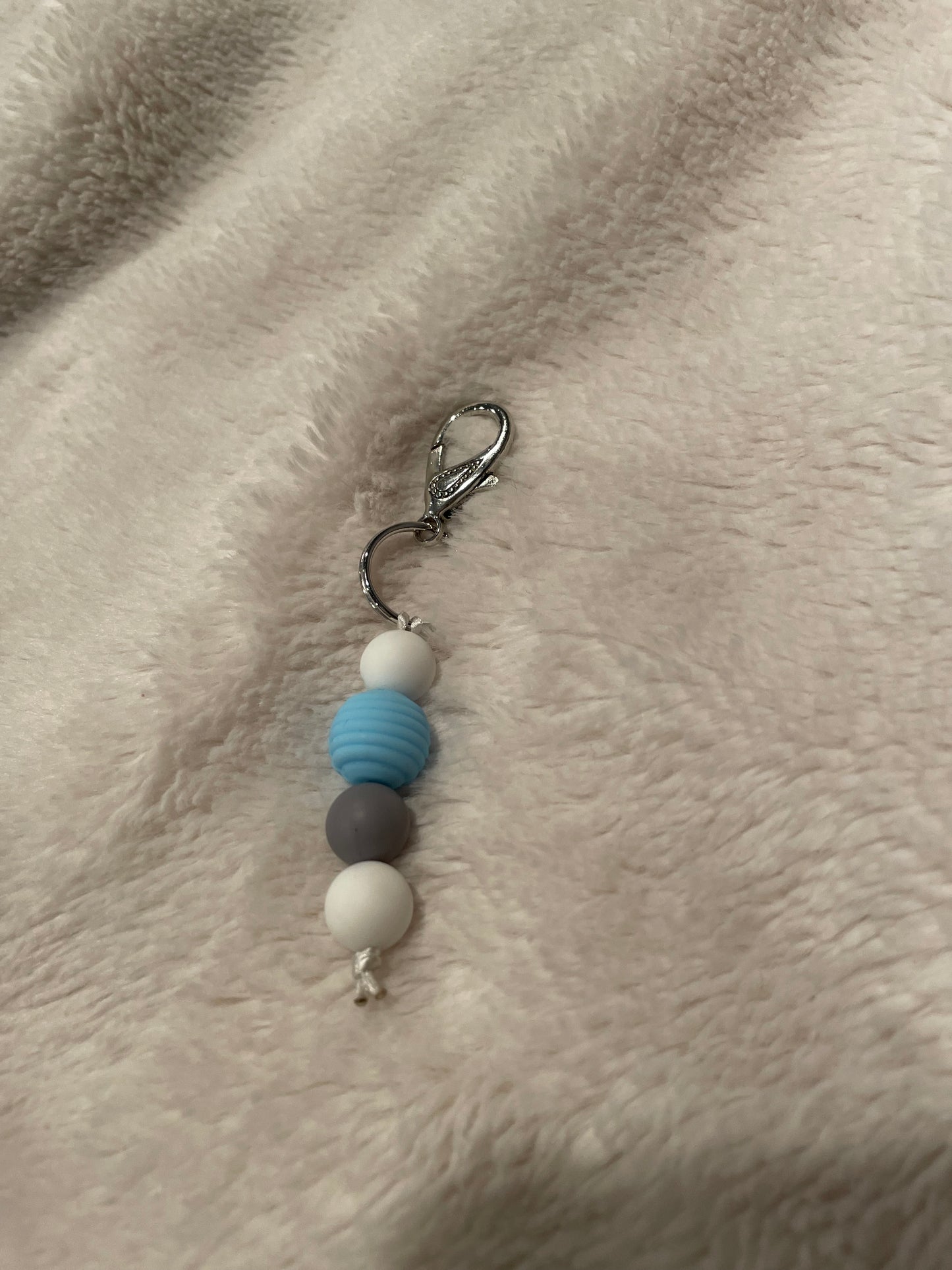 blue and gray keychain