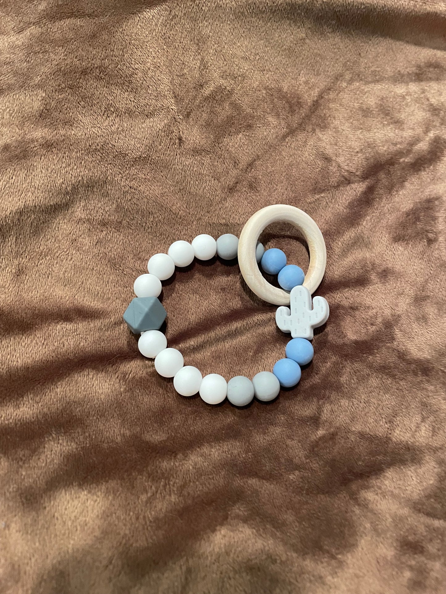 baby teether blue and gray