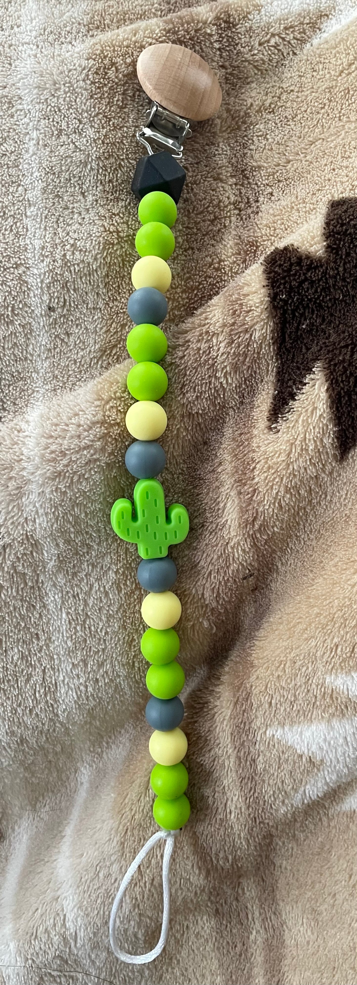 green paci clip